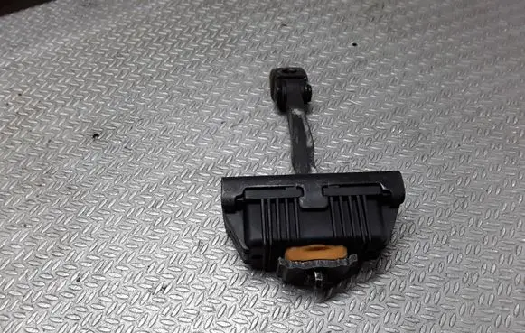 Front door check strap stopper