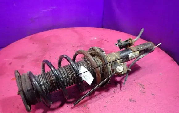 Mazda 3 II Front shock absorber with coil spring BBM234900A