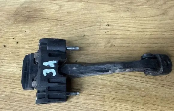 Volvo V70 Rear door check strap stopper 