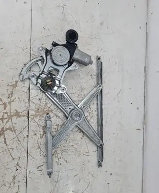 Toyota Yaris Front door window regulator with motor 8571052030 0621009981