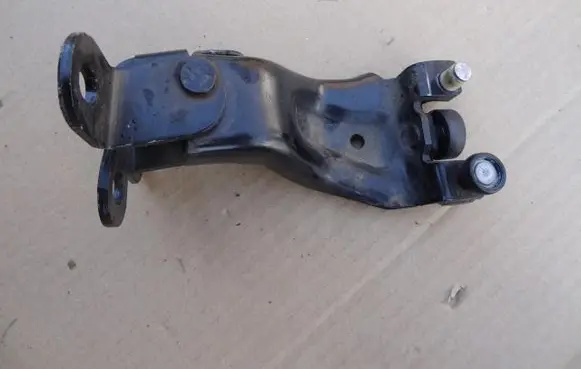 Ford Escort Sliding door upper roller guide/hinge ET76-A268B40-AC