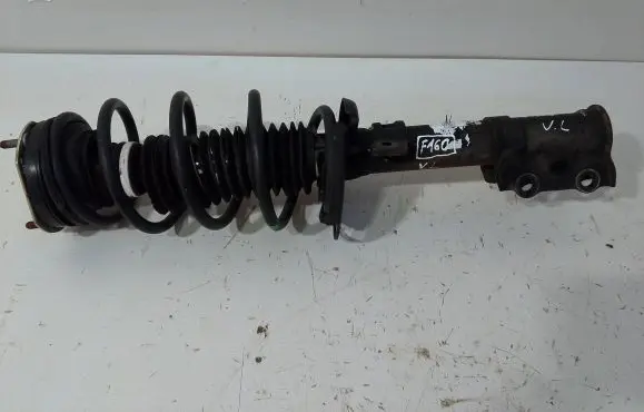 Ford Fiesta Front shock absorber with coil spring 61471149