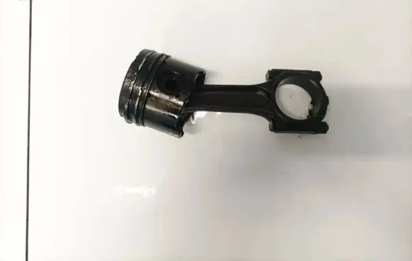 Piston with connecting rod