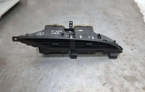 Toyota Yaris Dash center air vent grill 556700D240