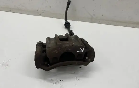 Dacia Spring Front brake caliper