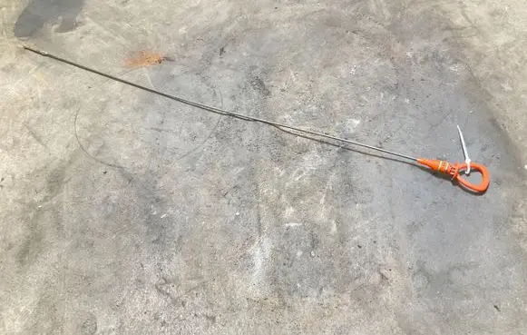 Oil level dip stick