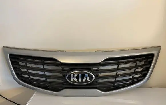 KIA Sportage Front bumper upper radiator grill 863513U000
