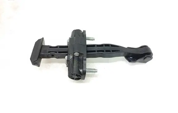 Front door check strap stopper