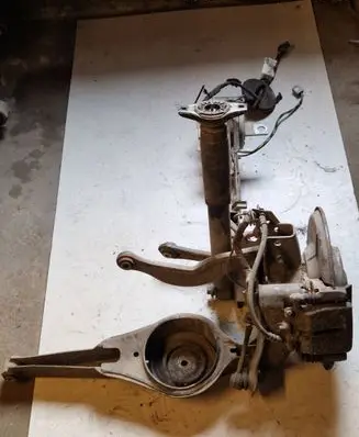 Rear wheel hub spindle/knuckle