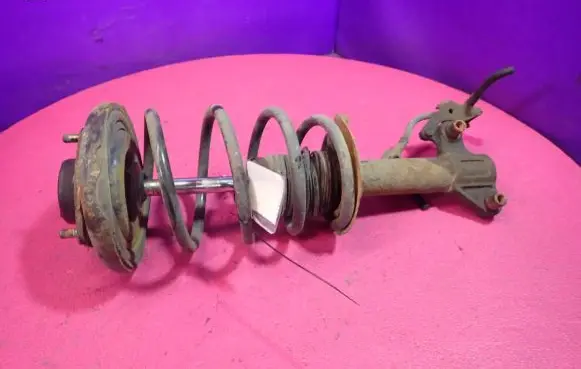 Nissan Primera Front shock absorber with coil spring