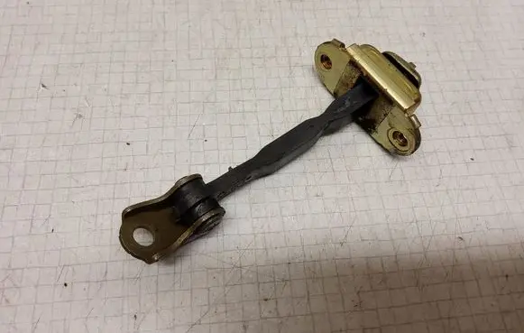 Nissan Almera N16 Front door check strap stopper