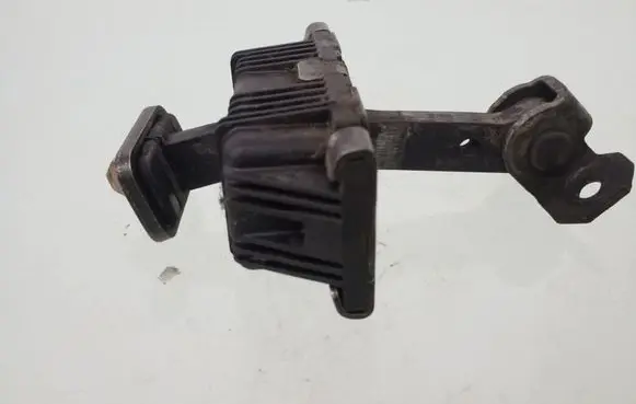 Front door check strap stopper
