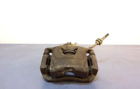 Opel Astra J Front brake caliper 