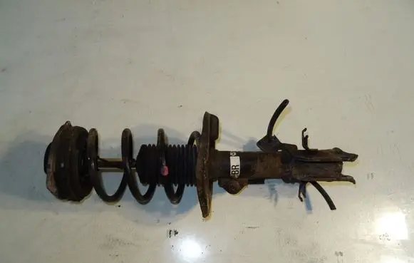 Nissan Pulsar Front shock absorber with coil spring