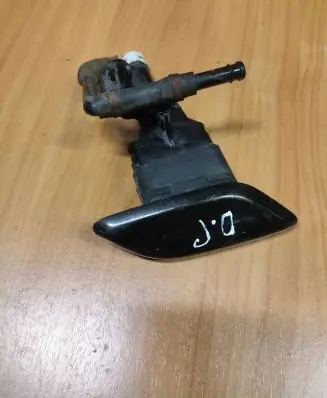 Headlight washer spray nozzle