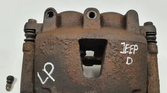 Jeep Grand Cherokee (WK) Front brake caliper
