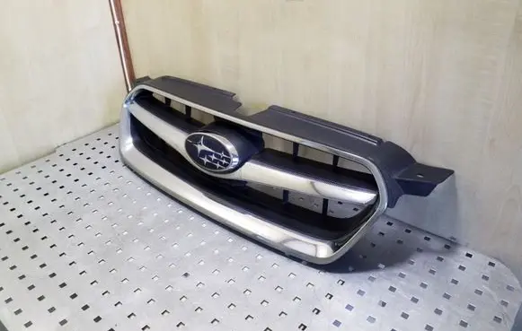 Subaru Legacy Front bumper upper radiator grill 91121AG150