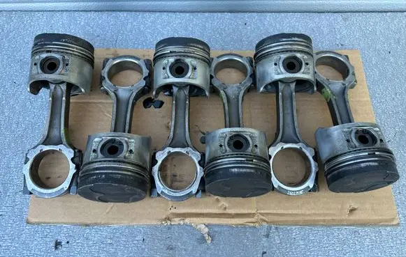 Nissan Patrol 260 Piston with connecting rod 1201022J11 1210022J00