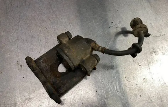 Volkswagen Golf II Front brake caliper