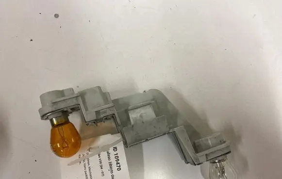 Volvo V50 Tail light bulb cover holder