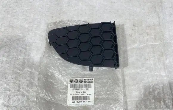 Fiat Punto Evo Front fog light trim/grill 735500132 0735502299 5QG78JXW