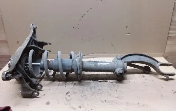 Front shock absorber with coil spring