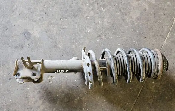 Opel Zafira B Front shock absorber/damper 22214599 644609745 24466540