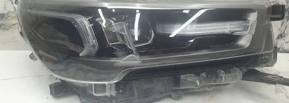 Toyota Hilux VIII Headlight/headlamp 8110-YP121 0296876