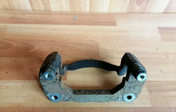 Mazda 6 Front Brake Caliper Pad/Carrier K0089