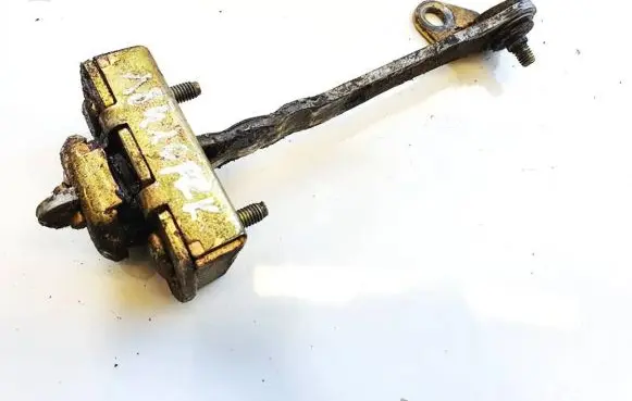 Front door check strap stopper