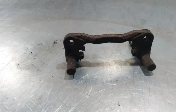 Mitsubishi Lancer VIII Brake caliper pad carrier rear 