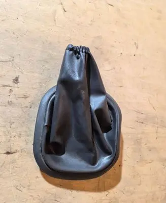 Ford Ka Gear shifter surround trim plastic 97KB7B118AF