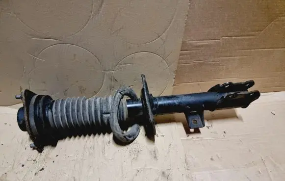 KIA Sportage Front shock absorber/damper 546513U000