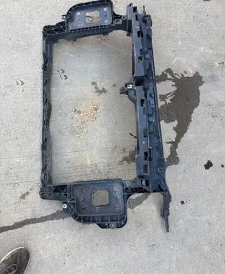 Top upper radiator support slam panel