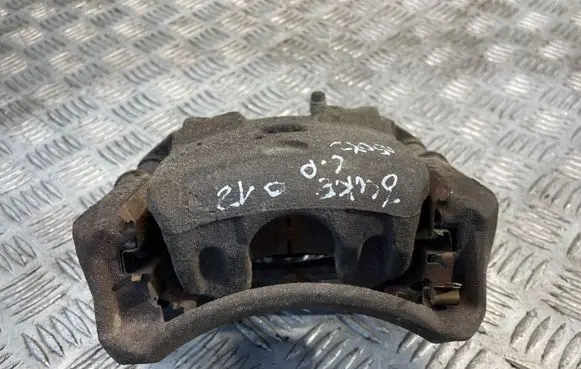 Nissan Juke I F15 Front brake caliper