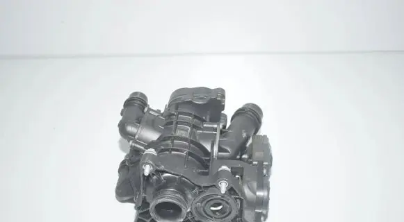 Thermostat/thermostat housing