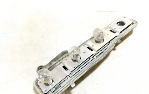Opel Astra G Tail light bulb cover holder
