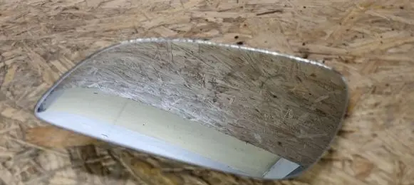 Volkswagen Touran I Wing mirror glass 1T0857521F