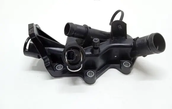 Thermostat/thermostat housing
