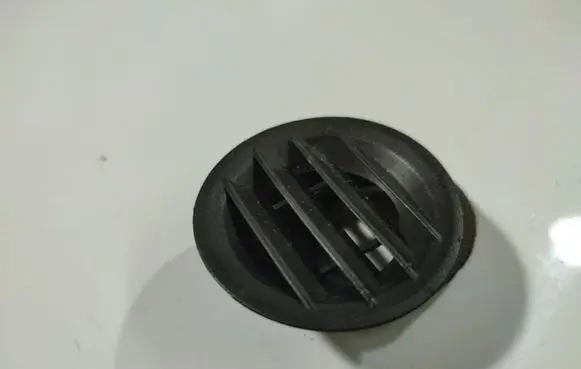Dash center air vent grill