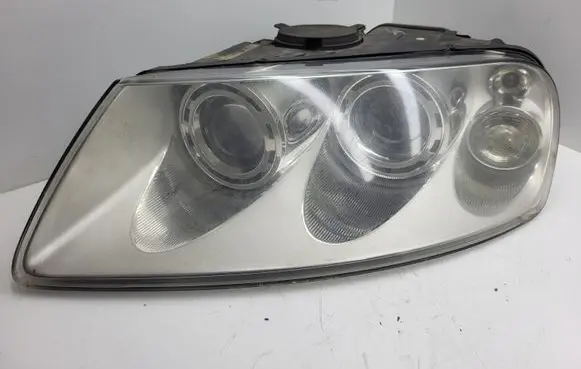Volkswagen Touareg I Headlight/headlamp 7L6941016BK