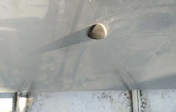 Windshield washer spray nozzle