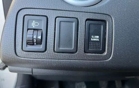 Suzuki Swift I Headlight level height control switch 