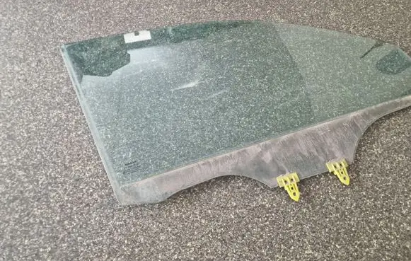 Nissan Micra Front door window glass four-door