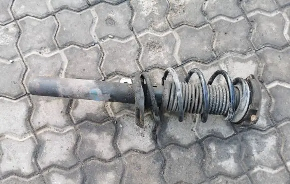 Volkswagen Golf VI Front shock absorber with coil spring