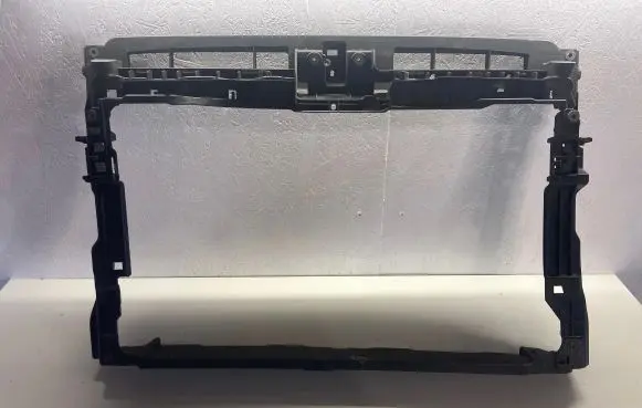 Radiator support slam panel