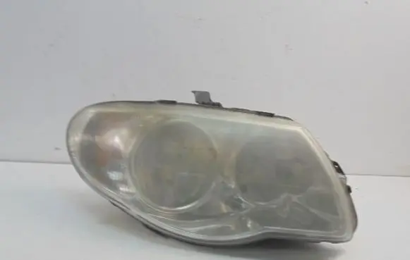 Chrysler Grand Voyager IV Headlight/headlamp 04857830AB
