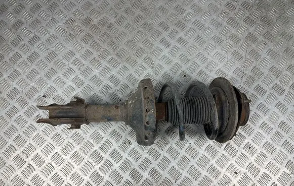 Subaru Legacy Front shock absorber with coil spring