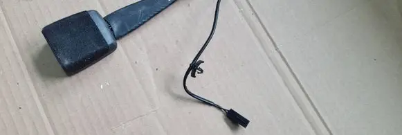 Front seatbelt buckle