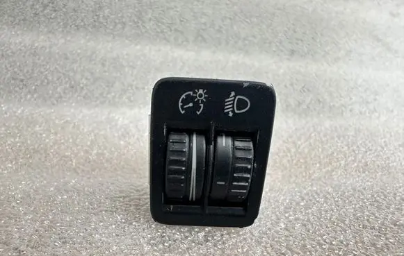 Headlight level height control switch